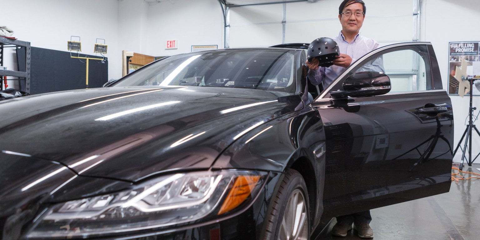 Yaobon Chen with one of his test cars