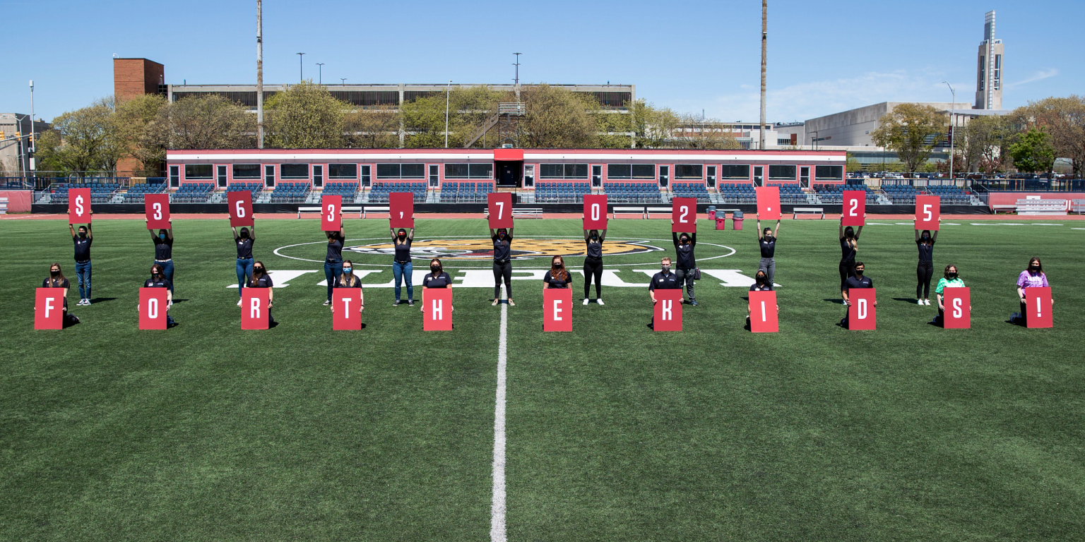 Jagathon students display signs in Carroll stadium.