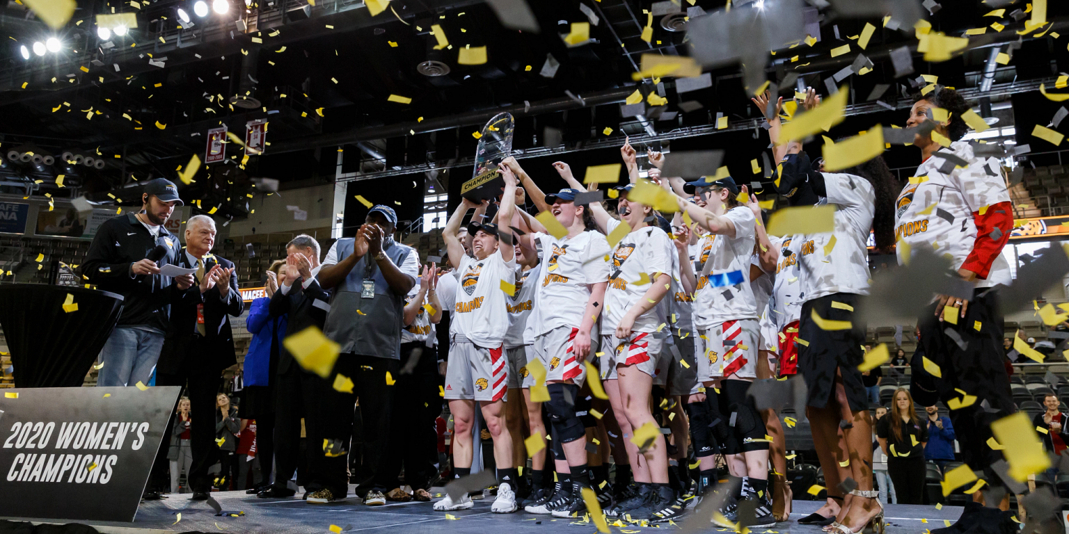 Confetti falls on the IUPUI women's basketball team after winning the Horizon League Tournament