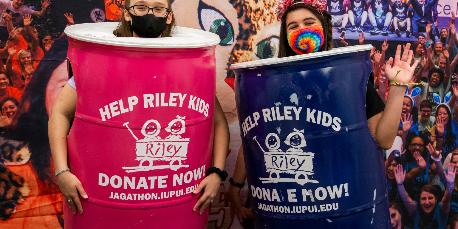 Two students dressed up as Jagathon donation cans.