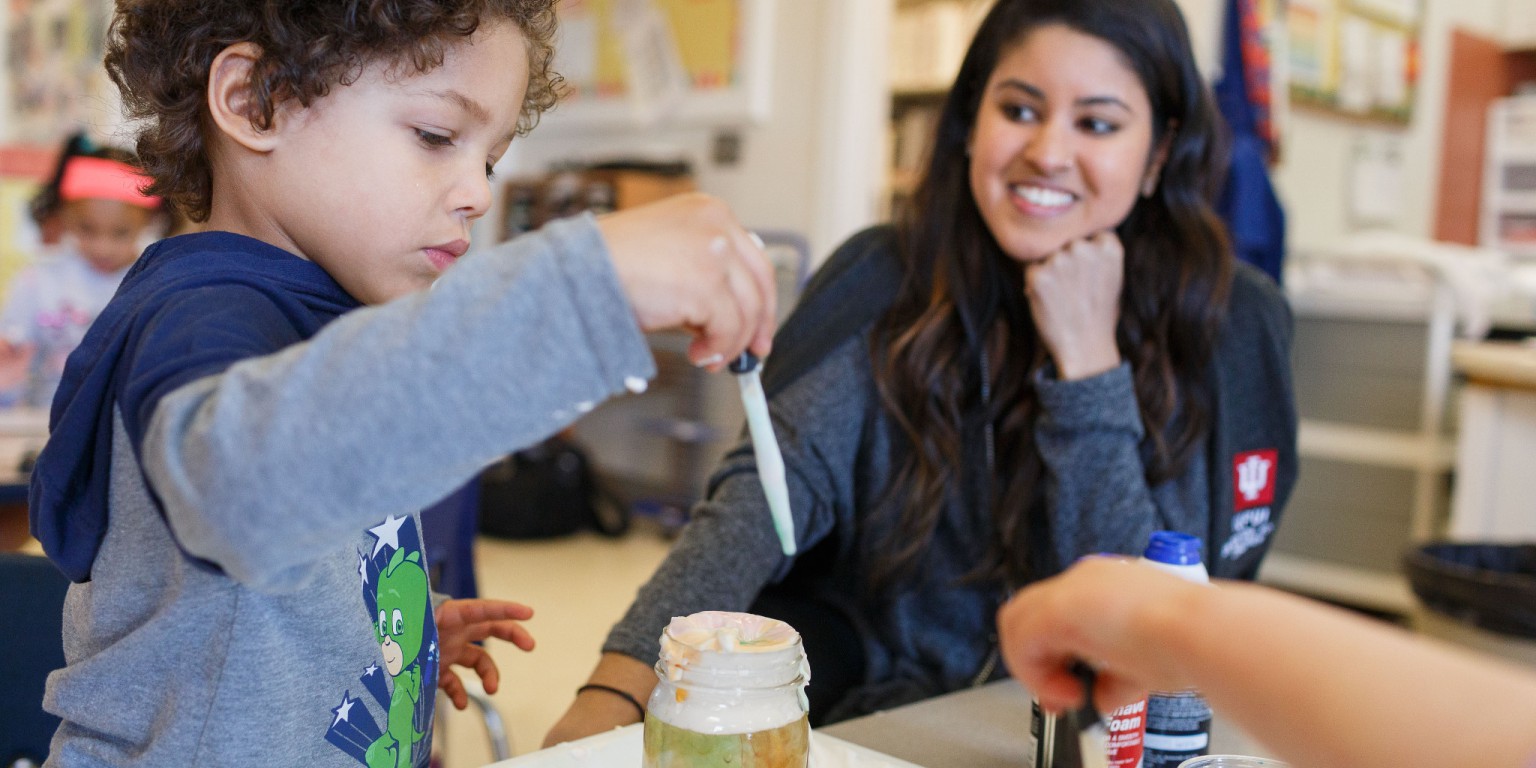 Fabiha Islam helps a student