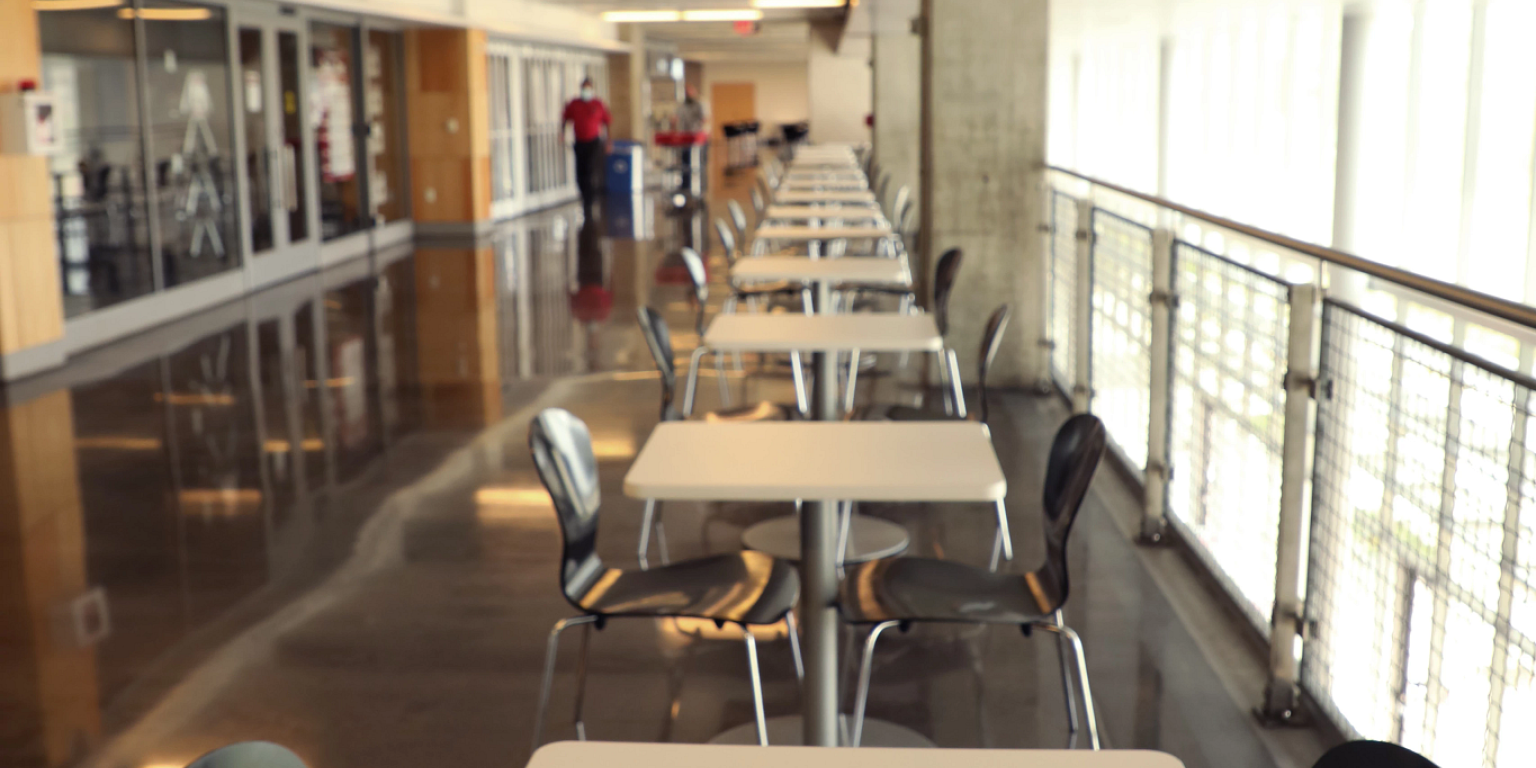 second floor of the campus center with chairs and tables spaced out
