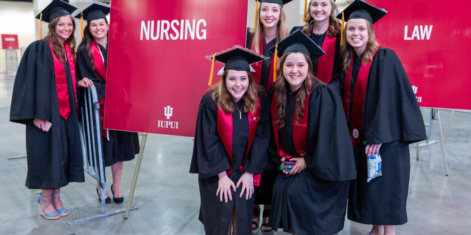 Nursing students pose for a picture at Commencement.