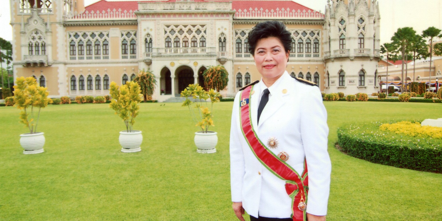 Pusadee Tamthai in front of the Thai White House. 