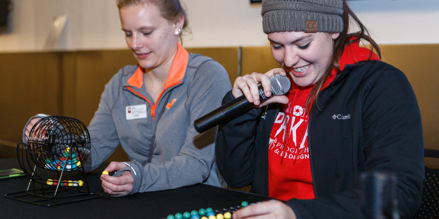 IUPUI students lead the crowd in family bingo.