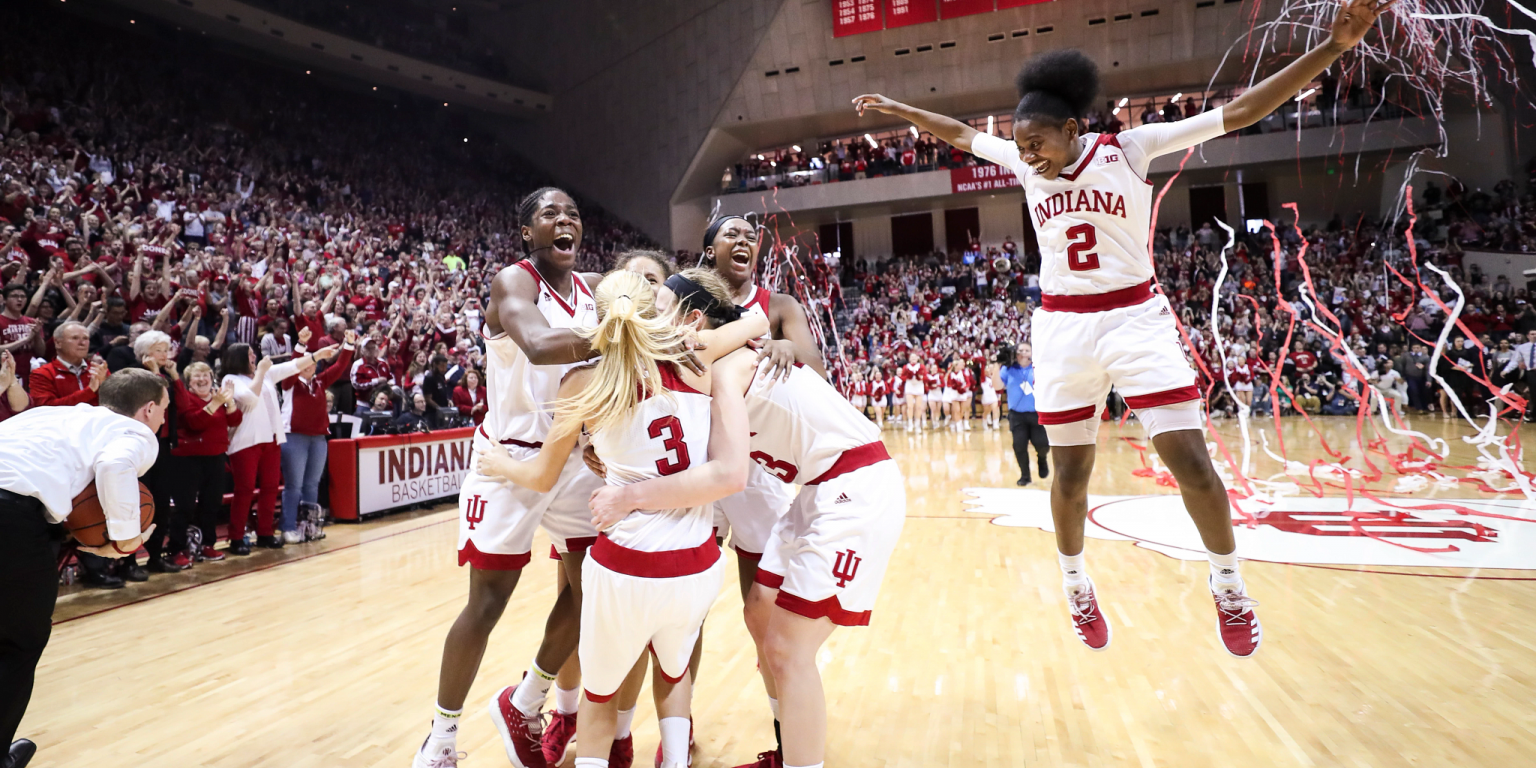 The IU women's basketball team celebrates after winning the 2018 WNIT championship