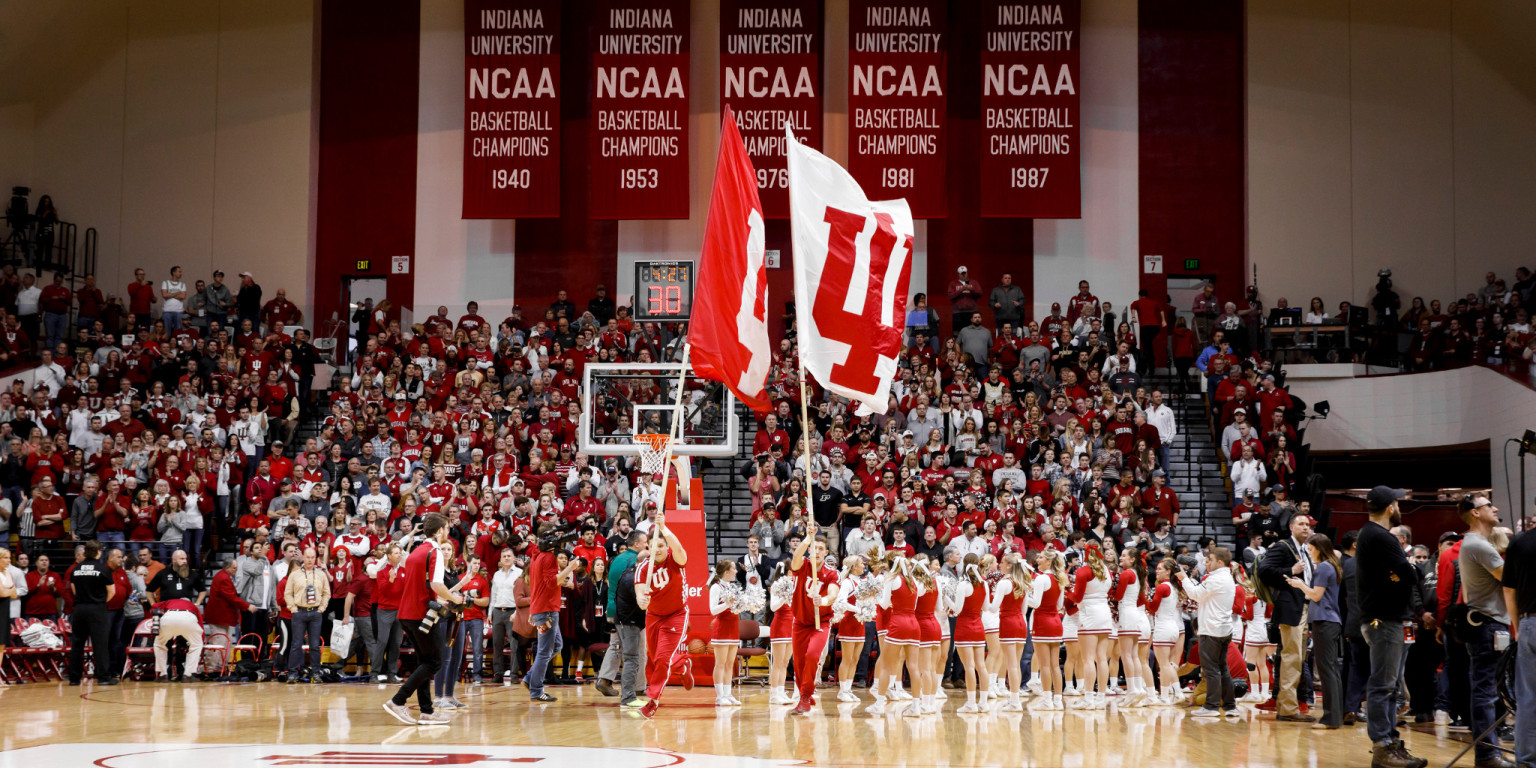 IU cheerleaders lead players onto the court before a game
