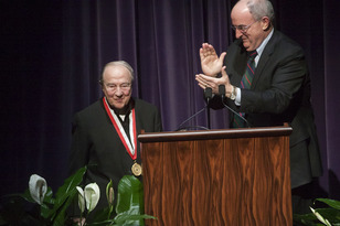 IU Jacobs School of Music professor Menahem Pressler received the University Medal from President Michael A. McRobbie at a Dec. 13, 2013, gala concert held in honor of Pressler's 90th birthday.