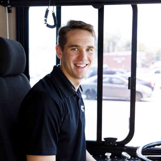 Byron Gurzo sits on his bus.