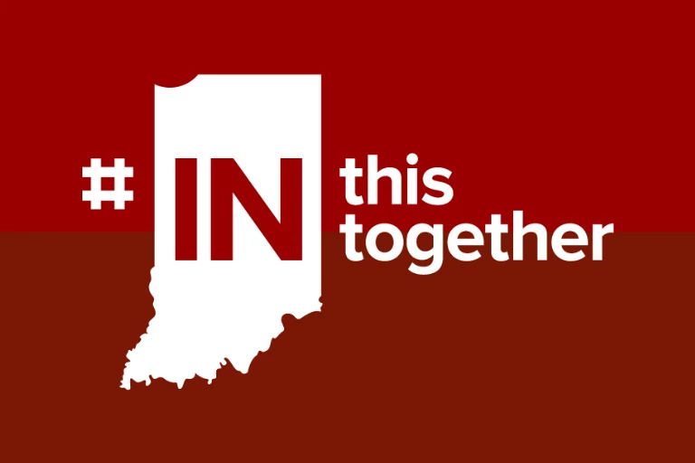 the outline of the state of indiana with the words 'in this together'