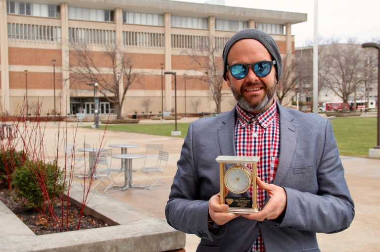 Marc McAleavey stands outside Taylor Hall.