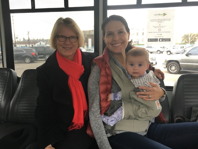 Kim Rosvall with her daughter and mother on her way to a conference. 