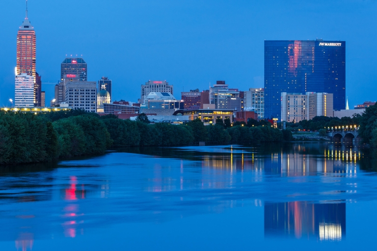 Indianapolis skyline at dusk along White River Parkway