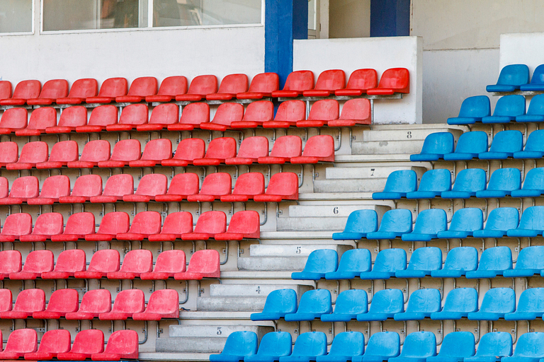 Red and blue bleacher chairs