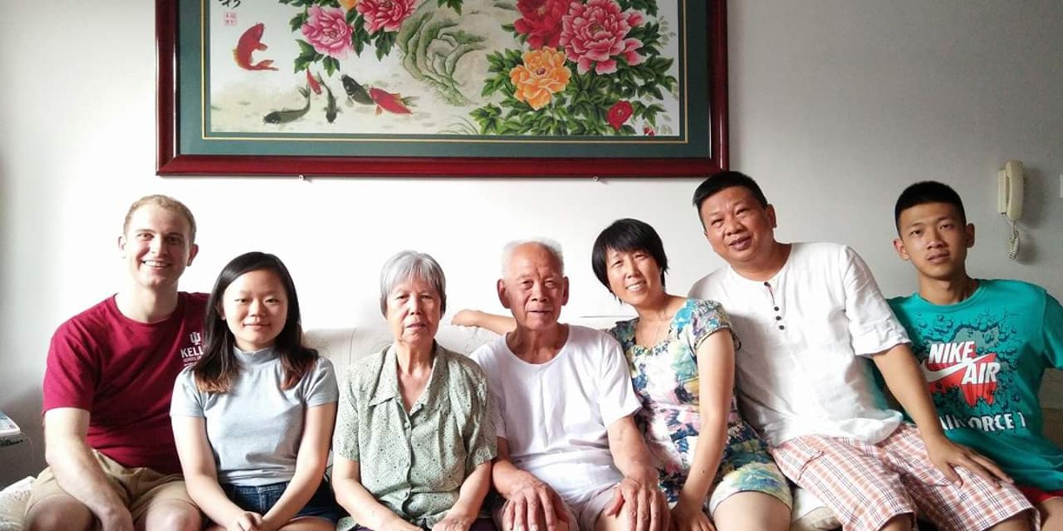 Stephen Hopkins with his host family 