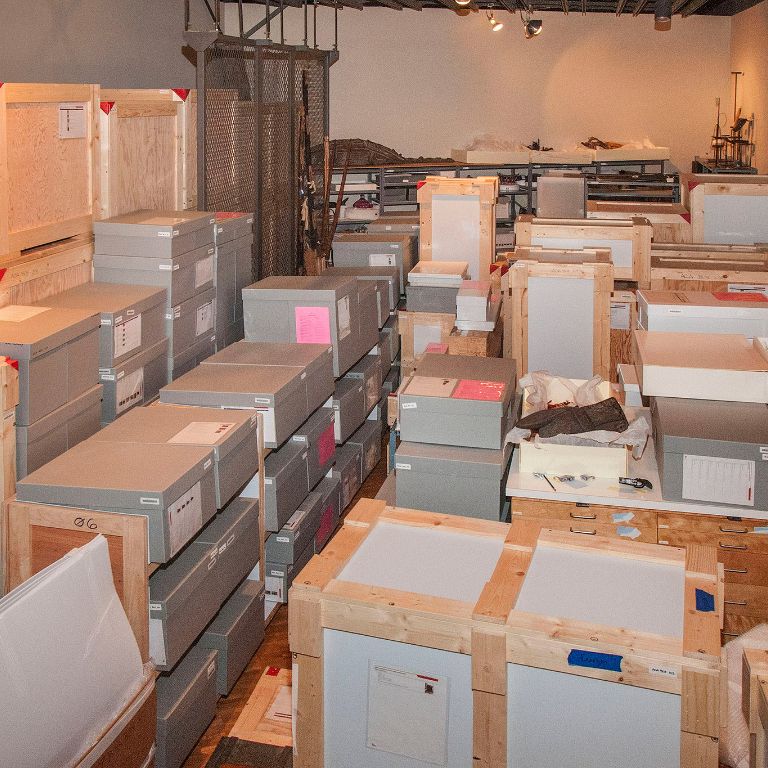 Boxes filled with art sit at the Eskenazi Museum of Art