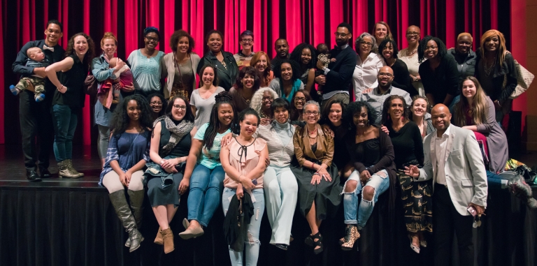 Iris Rosa poses with alumni of the African American Dance company during this year's spring concert.