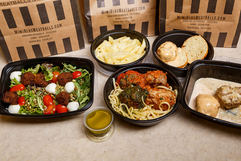 Salads, various pasta dishes, and meatball dishes look tempting.