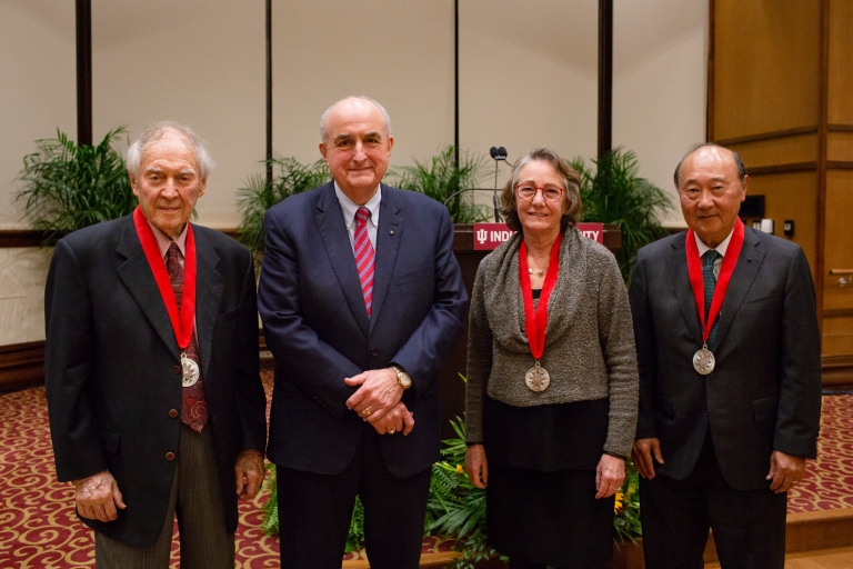 IU President McRobbie stands with the award recipients