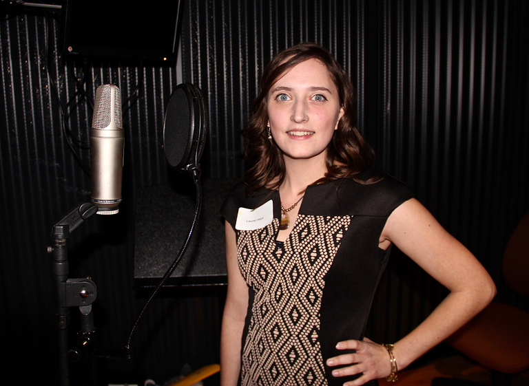 Laurel Hays poses for a picture in a sound studio.