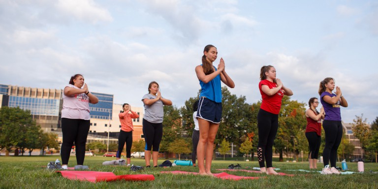 Students participate in yoga at the CROF.