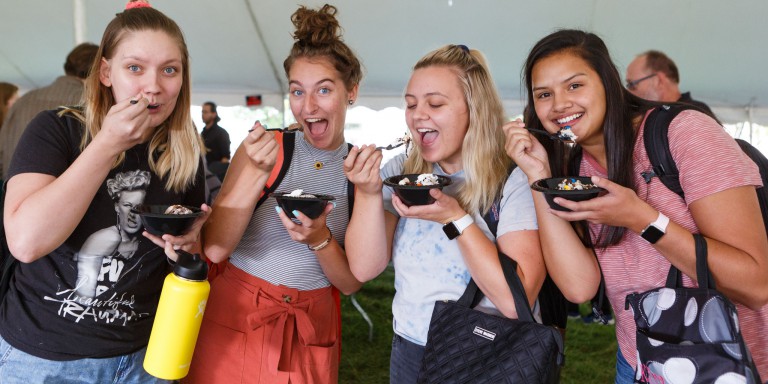 Students pose with their ice cream at the 42nd Annual Ice Cream Social.