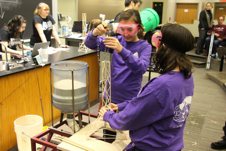 Students conduct an experiment at the Indiana State Science Olympiad on March 18