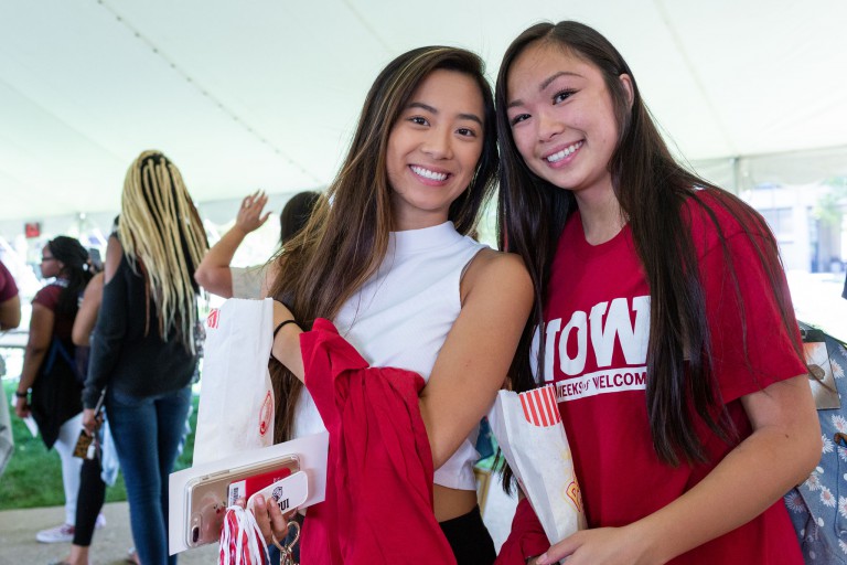 Two female students at a Weeks of Welcome event