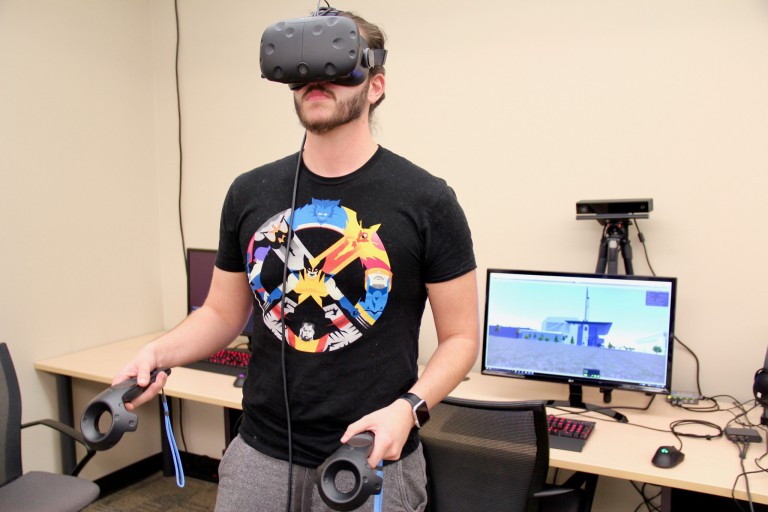 A student uses the virtual reality headset