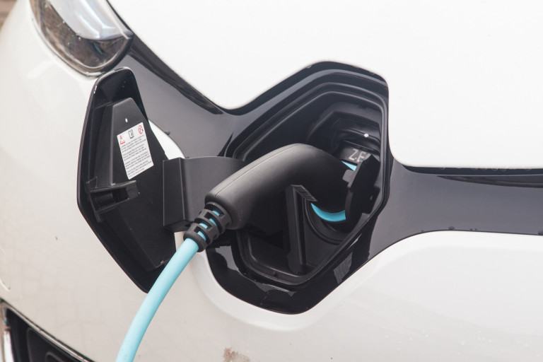 Electric vehicle plug-in port.