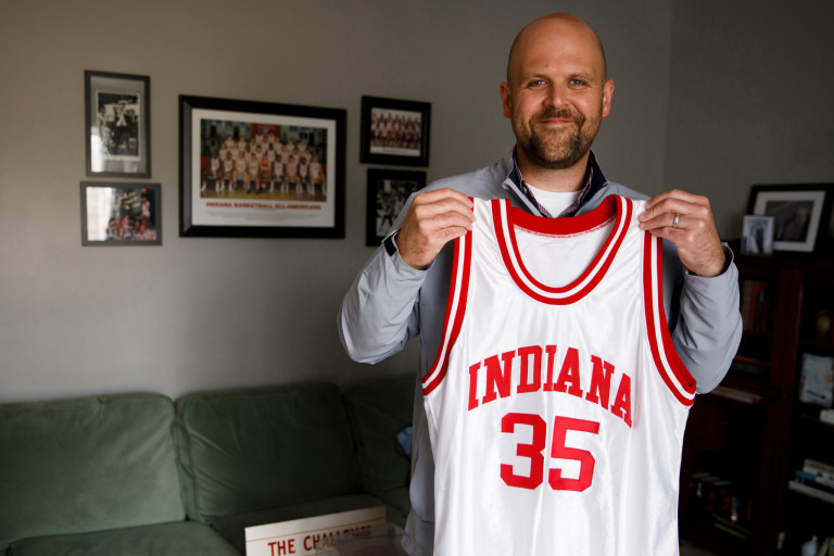 Chris Williams holds a white Indiana jersey
