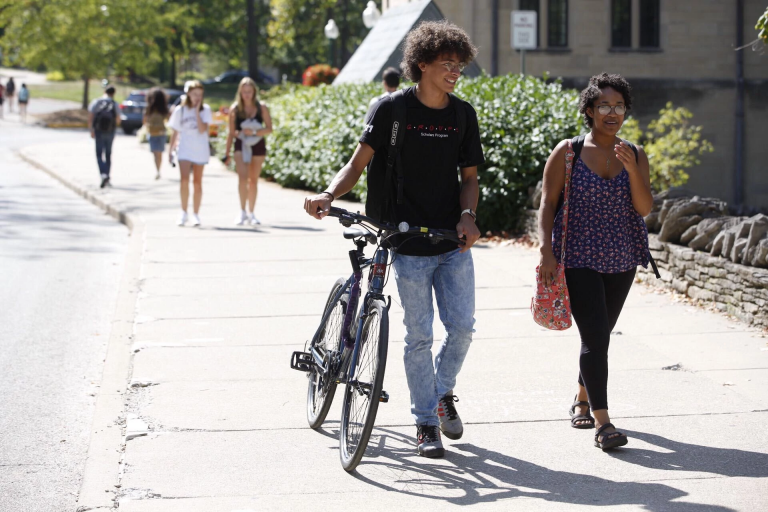 Two students walk on the IU Bloomington campus