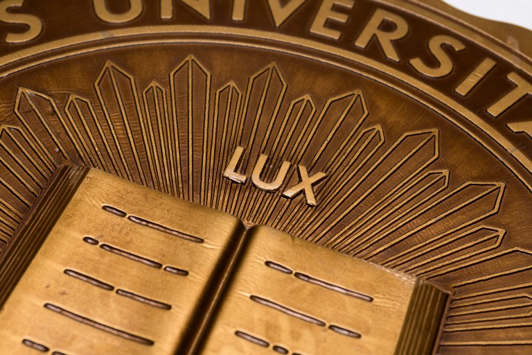 IU gold seal with the word Lux
