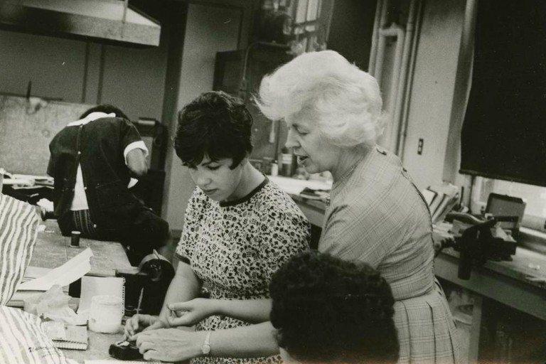 Alma Eikerman helping a student