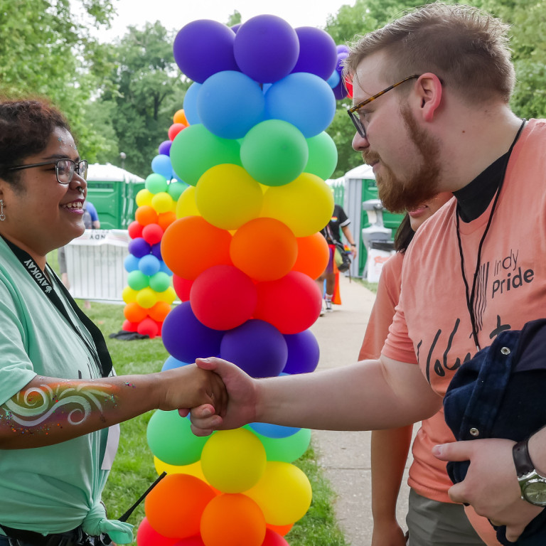 2019 IUPUI graduate and Indy Pride intern Esther Calderon greets volunteers at Military Park.