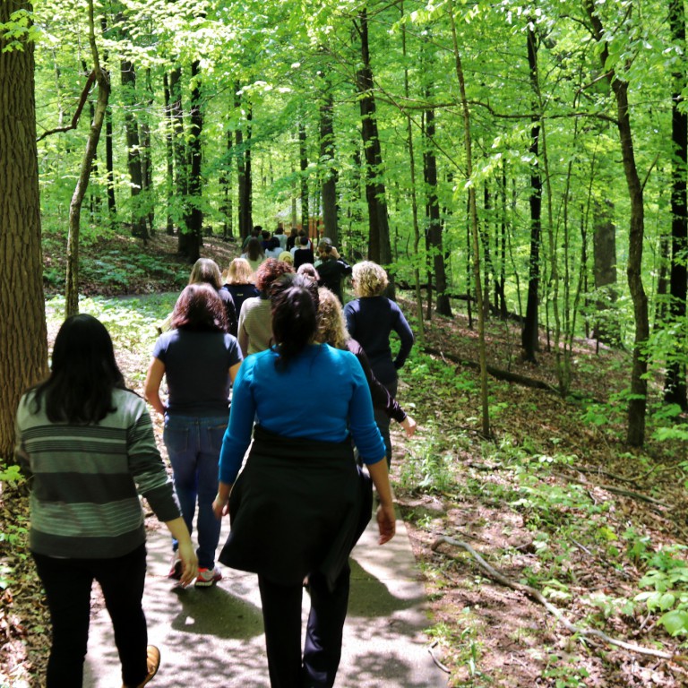 Part of the Scholarly Writing Program's writing retreat included a walk in the woods.