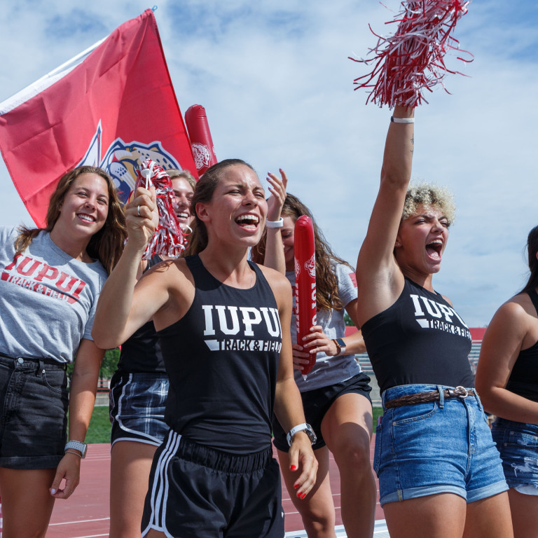 IUPUI students cheer on the Jaguars at the men's soccer match.
