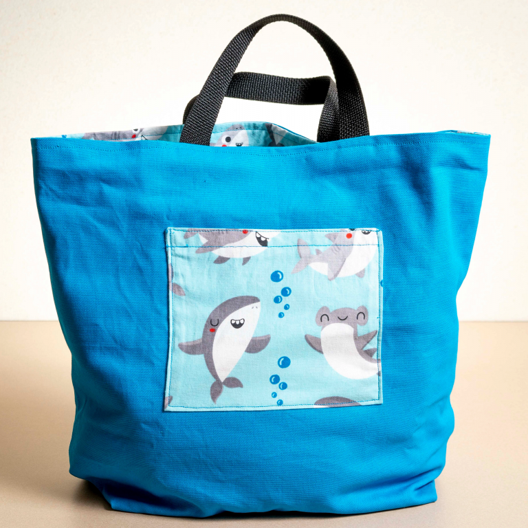 A tote bag with images of sharks
