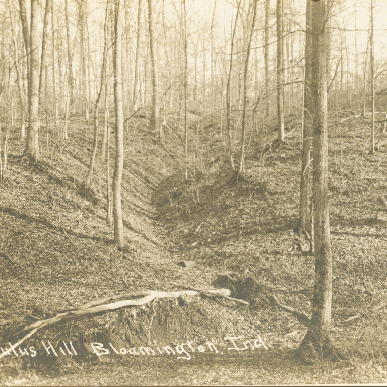 A black and white photo labeled Arbutus Hill, Bloomington, Indiana