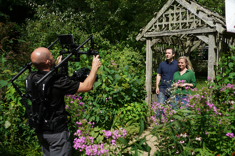 Hosts Ashley Dillard and Brandon Wentz filming. 