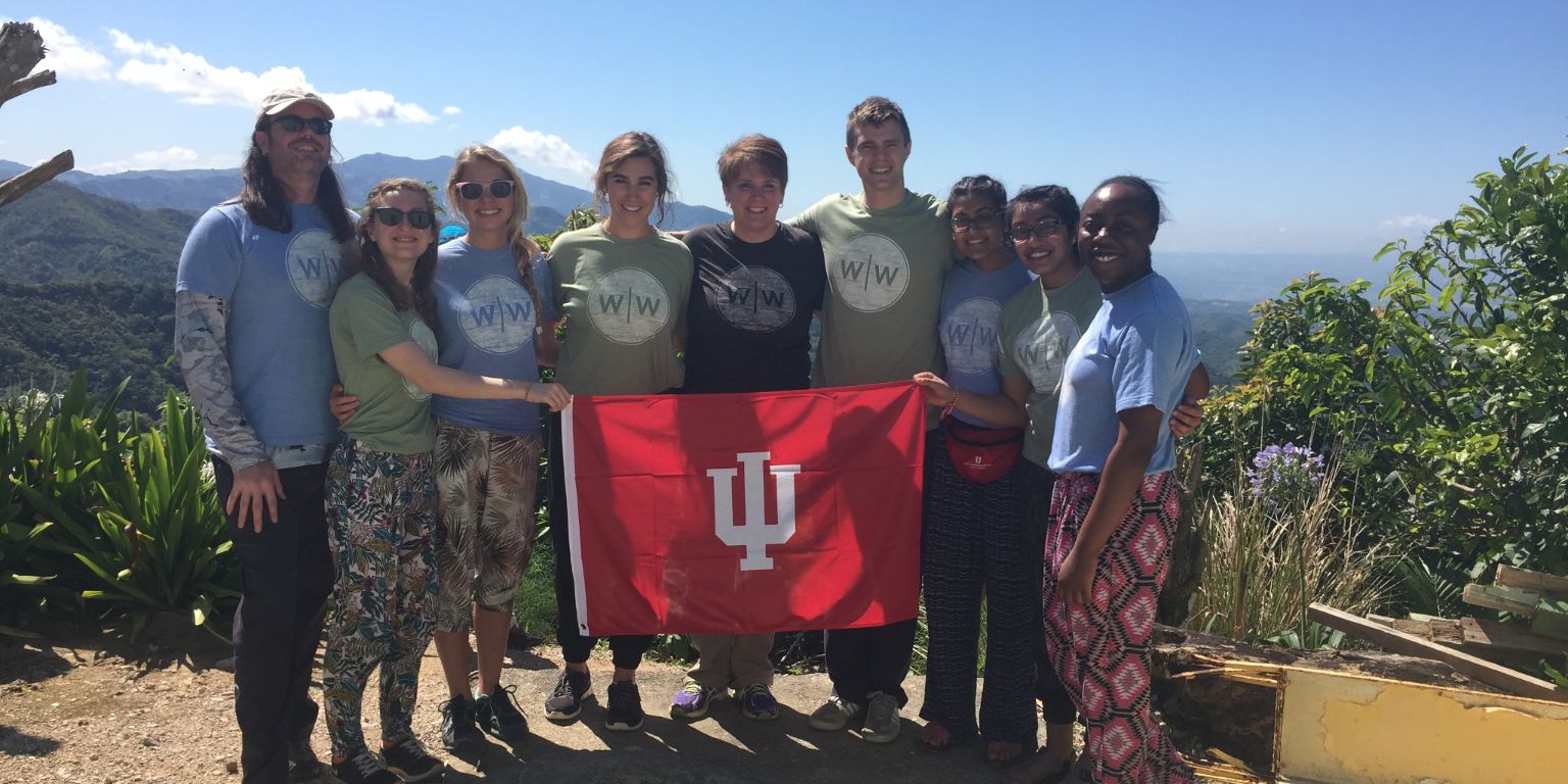 Students with the Timmy Water Project pose with an IU flag in La Cayota, Dominican Republic.