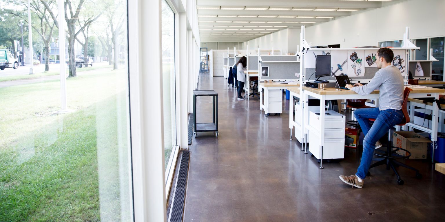 Students at desks in the home of IU's architecture program 