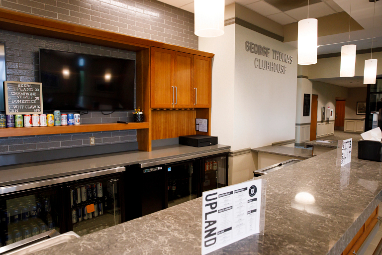 The bar of the Upland restaurant inside the George L. Thomas Clubhouse