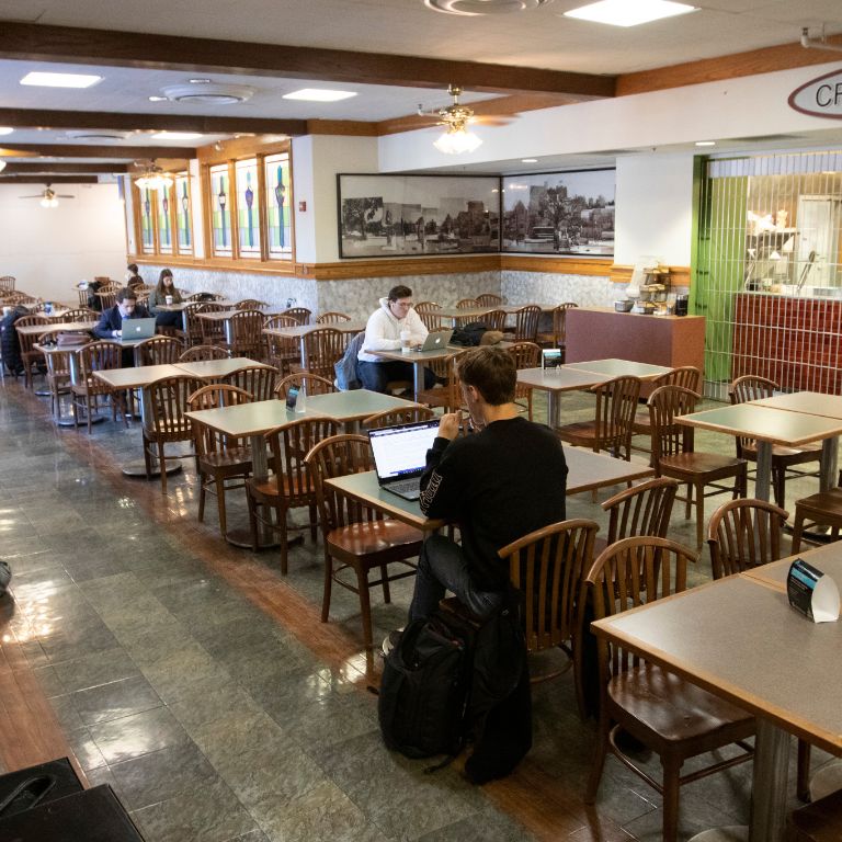 People eat at the IMU food court