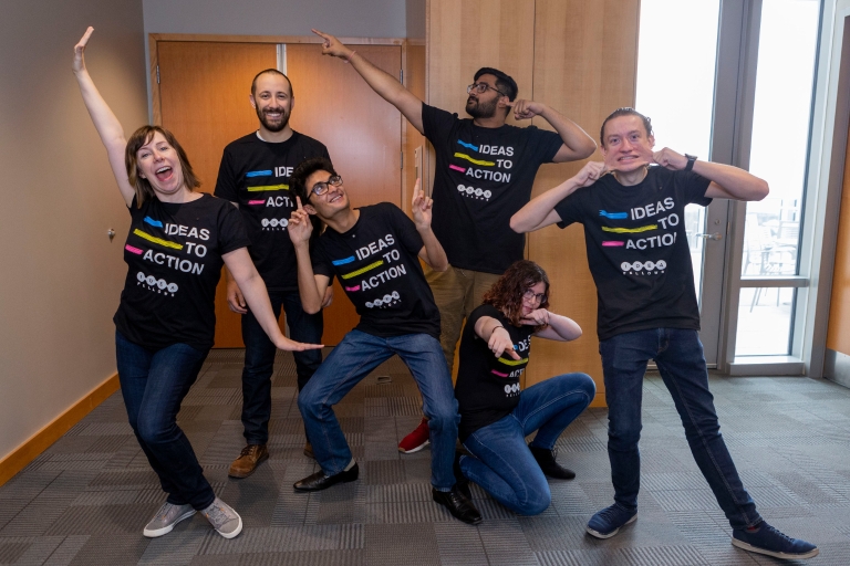 Six new University Innovation Fellows receive pins.