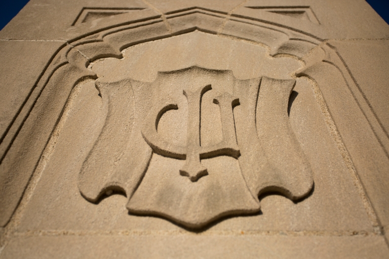 IU trident in limestone