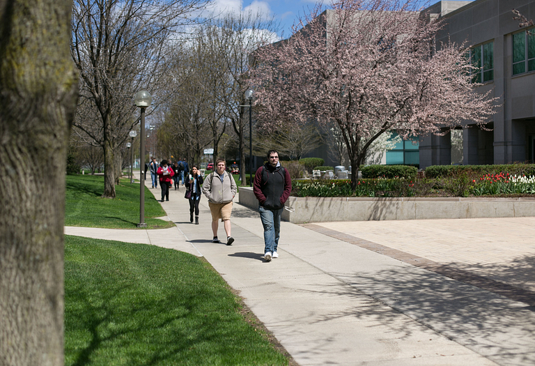 Students walk outside on the IU South Bend campus.