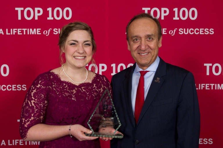 Chancellor Paydar poses with last year's Top 100 student, Sarah Grace Fraser.