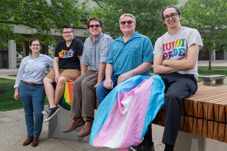 Students pose with Indianapolis Pride Parade founder Gary Brackett.