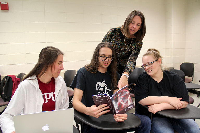 Sarah Layden works with Genesis' managing editors.